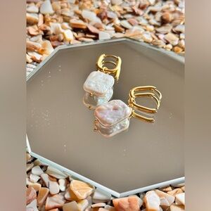 Gold and Cream Dangle Earrings with Intricate Design